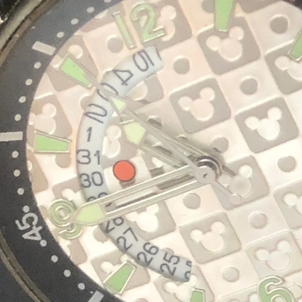 Disney Time Works Swing Glowing Date Watch